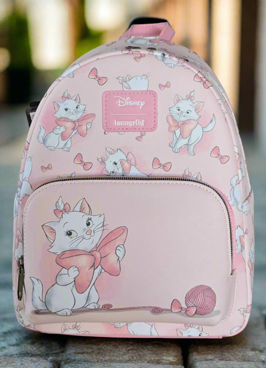 Pink backpack with Disney character design on a gray surface