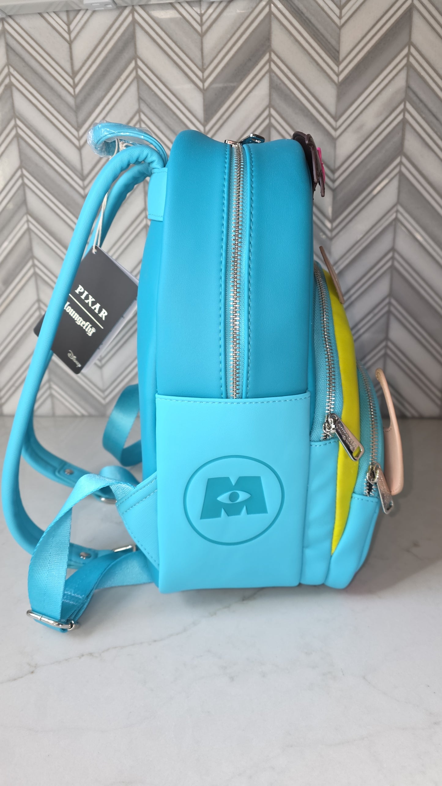 Disney Pixar Monster's Inc Retired Multi-Character Triple Pocket Mini Backpack